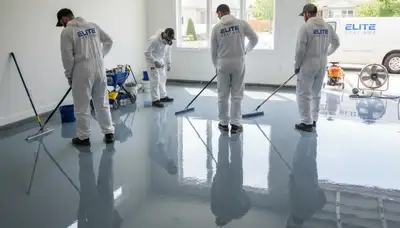 Epoxy floor coating in Burlington MA garage by professional house painters for durable finish