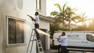 Technician pressure washing house exterior in Burlington, MA for expert home cleaning service